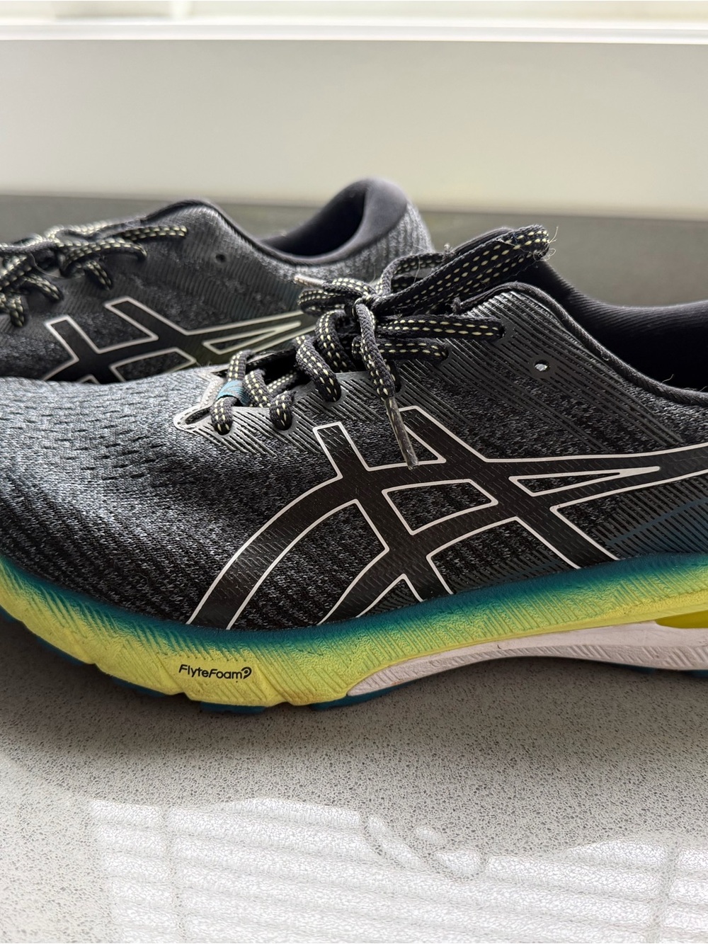 Asics Men's Athletic Shoes - Black with Teal and Yellow Gradient Midsole